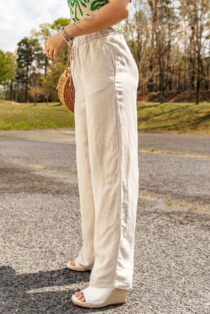 Бежевые льняные брюки прямого кроя с резинкой на поясе