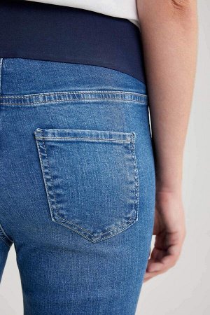 Длинные брюки для беременных скинни с рваными деталями