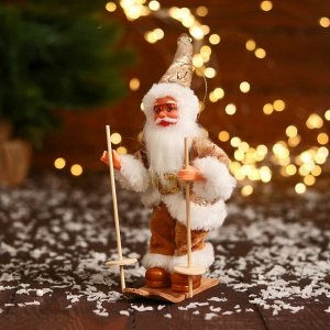 Дед Мороз "В блестящем костюмчике, на лыжах" 16 см, золотисто-белый