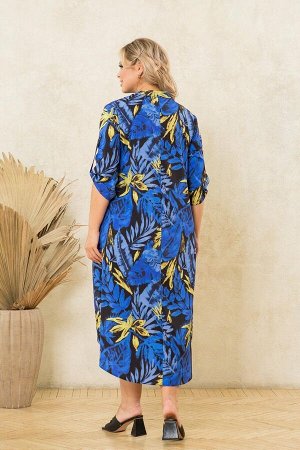 Платье Платье свободного силуэта. Выполнено из эластичной плательной ткани Ниагара. Расцветка синие и желтые листья на темно-синем. V-образный вырез горловины и воротник стойка. Рукава на пате 33 см. 