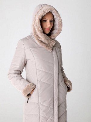Пальто Зимнее пальто прямого силуэта с легким приталиванием, втачными рукавами и ассиметричной застежкой на двухзамковую молнию и кнопки. Это элегантное длинное пальто с вортником и отворотами на рука