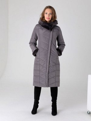 Пальто Зимнее пальто прямого силуэта с легким приталиванием, втачными рукавами и ассиметричной застежкой на двухзамковую молнию и кнопки. Это элегантное длинное пальто с вортником и отворотами на рука
