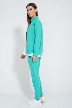 Костюм Костюм Kivviwear 3048305101 бенеттон 
Состав: ПЭ-15%; Хлопок-85%;
Сезон: Осень-Зима
Рост: 170

Спортивный костюм из трехниточного футера высшего качества с карманами на молнии. Костюм состоит 