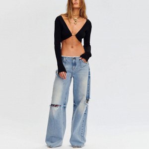 Широкие рваные джинсы с низкой талией