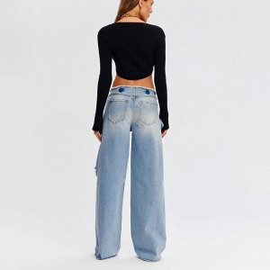 Широкие рваные джинсы с низкой талией