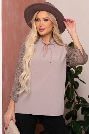 Блузка Блузка из текстильного полотна с рукавами из кружева.
30% вискоза 65% п/э,5% эластан