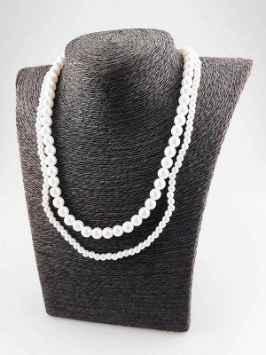 Ожерелье Ожерелье из дух ниток искусственного жемчуга разного диаметра.
Длина изделия:
52 см.
Состав:
Искусственный жемчуг.
белый
