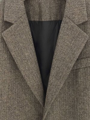 Пиджак Женский прямой однобортный шерстяной пиджак с подплечниками свободного кроя с длинными рукавами со стандартной линией плеч и застежкой на пуговицы. Два передних прорезных кармана. Манжеты на пу