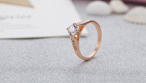 Кольцо Позолоченное розовым золотом 750 пробы (18K Gold Plated) кольцо с красивым многогранным фианитом и супер блестящими кристаллами Swarovski Stellux, невероятно привлекательное кольцо, по красоте 