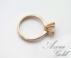 Кольцо Позолоченное розовым золотом 750 пробы (18K Gold Plated) кольцо c супер блестящим прозрачным многогранным фианитом!