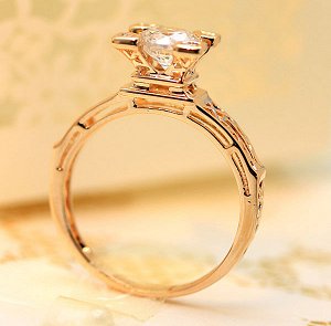 Кольцо Позолоченное розовым золотом 750 пробы (18K Gold Plated) кольцо c супер блестящими кристаллами и многогранным фианитом Swarovski Stellux! Цвет Российского золота, один в один, не отличить!