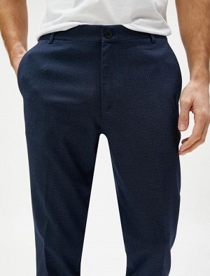 Тканые брюки с карманами на пуговицах и деталями