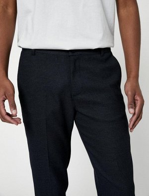 Тканевые брюки узкого кроя с карманами