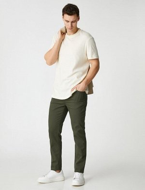 Узкие брюки с 5 карманами, текстурированные на пуговицах