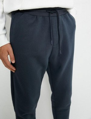 Спортивные брюки-джоггеры с кружевной талией и карманами