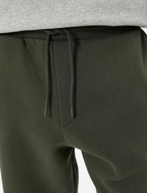 Спортивные брюки-джоггеры с кружевной талией и карманами