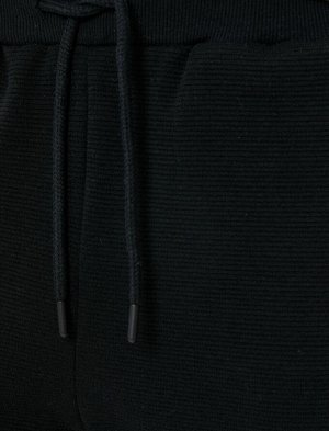 Спортивные брюки Jogger с этикеткой, карманом на молнии и кружевной талией