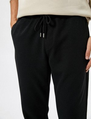 Спортивные брюки-джоггеры с кружевным поясным карманом