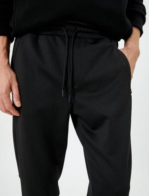 Спортивные брюки-джоггеры с карманами и кружевной талией