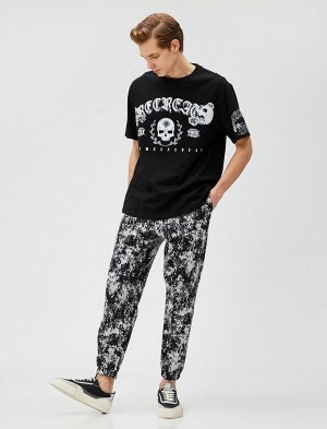 Спортивные брюки Jogger с абстрактным принтом, карманами и завязкой на талии