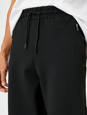 Базовые спортивные штаны с карманом на молнии на кружевной талии