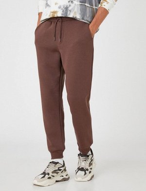 Базовые спортивные штаны-джоггеры с кружевным поясным карманом