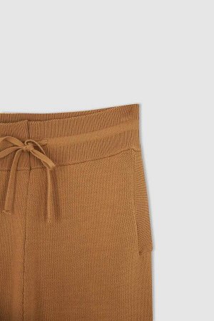 Трикотажные спортивные штаны свободного покроя с кружевной талией