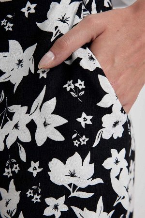 Льняные брюки с цветочным узором