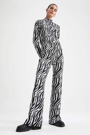 Спортивные штаны с узором «зебра»
