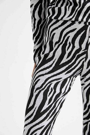Спортивные штаны с узором «зебра»