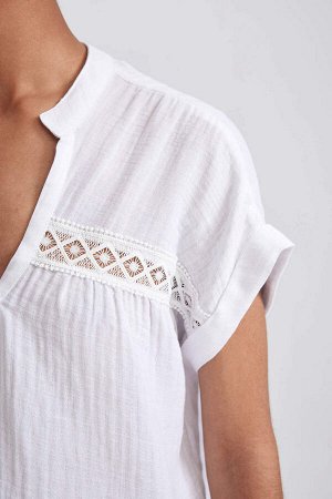 Укороченная блузка из 100% хлопка с короткими рукавами и круглым вырезом