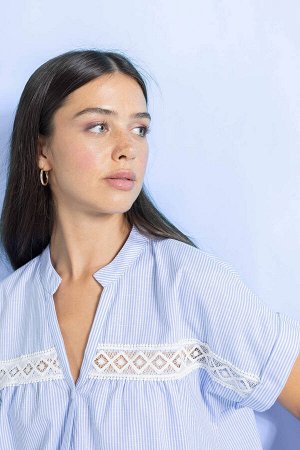 Укороченная блузка из 100% хлопка с короткими рукавами и круглым вырезом