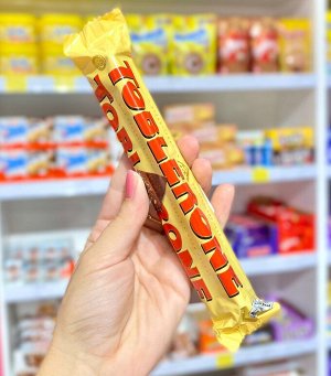 Шоколадный батончик Toblerone Switzerland / Швейцарский молочный шоколад Тоблерон с медово-миндальной нугой 50 гр