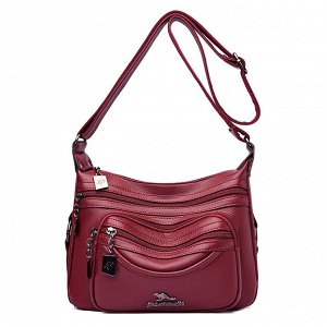 Женская мягкая сумка почтальонка из эко кожи, с широким ремешком и декоративными металлическими пуллерами, цвет винный