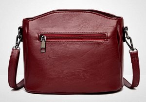 Женская сумка почтальонка из эко кожи с регулируемым ремешком и большим отделением, цвет винный