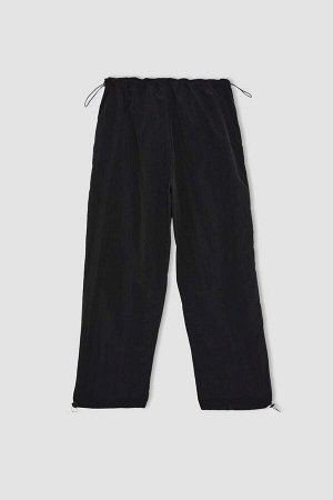 Длинные спортивные штаны DeFactoFit с карманом-парашютом и гибкими окантовками на штанинах