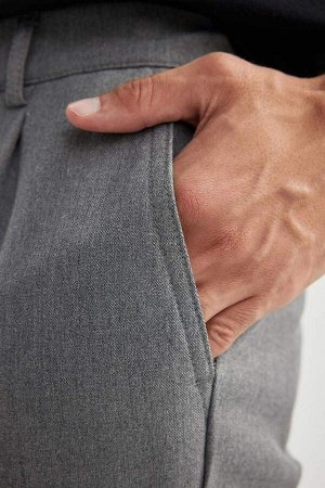 Всенаправленные эластичные спортивные брюки с карманами-карго