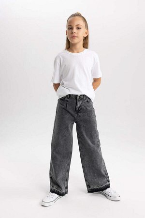 Широкие джинсовые брюки для девочек с отрезными штанинами