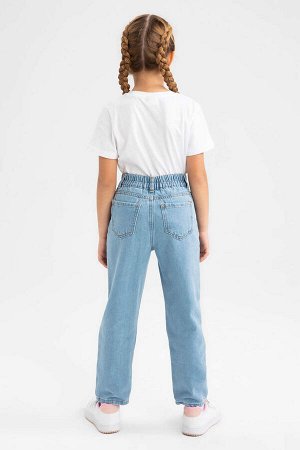 Рваные джинсовые брюки мамы для девочки