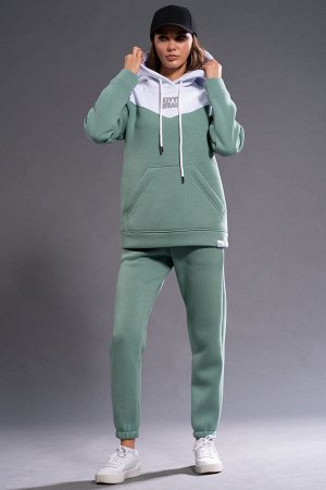 Костюм Костюм Kivviwear 3052305304 нефрит 
Состав: ПЭ-26%; Хлопок-70%; Эластан-4%;
Сезон: Осень-Зима
Рост: 170

Худи с двухцветным дизайном привлекает внимание благодаря отделочной кокетке. Она добав