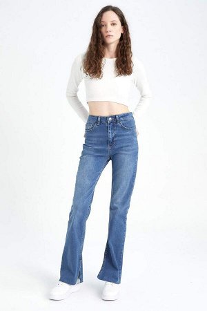 Узкие длинные джинсовые брюки с высокой талией и вырезами на штанинах