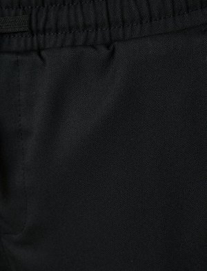 Тканевые брюки, приталенный крой, кружевной пояс, карман, деталь до щиколотки