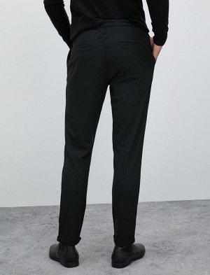 Тканевые брюки, приталенный крой, кружевная талия, узкий карман на штанинах
