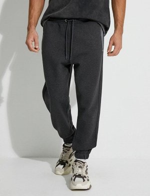 Спортивные брюки-джоггеры с карманом на молнии на кружевной талии
