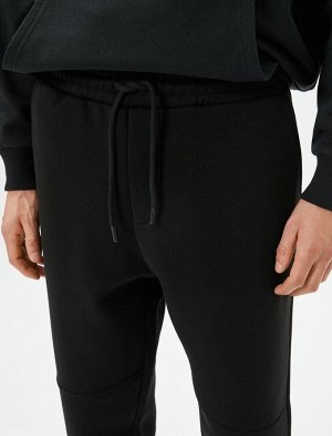Спортивные брюки-джоггеры с вышивкой кармана на кружевной талии