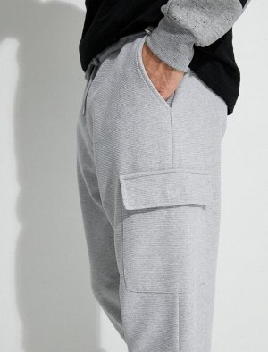 Спортивные брюки-карго с кружевной отделкой на талии и текстурированными карманами