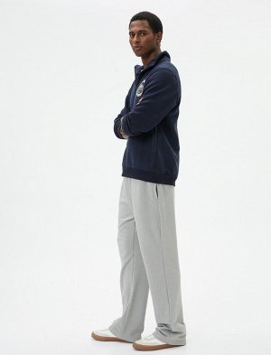 Спортивные штаны оверсайз с эластичным поясом, карманами и широкими штанинами