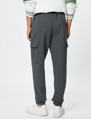 Спортивные брюки-карго с кружевными карманами на талии и строчкой