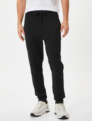 Спортивные брюки-джоггеры с отстрочкой, кружевной талией и карманом