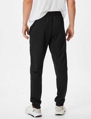 Спортивные брюки-джоггеры с отстрочкой, кружевной талией и карманом